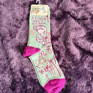 New! Green and pink Blue Q crew socks shows woman gardening outside